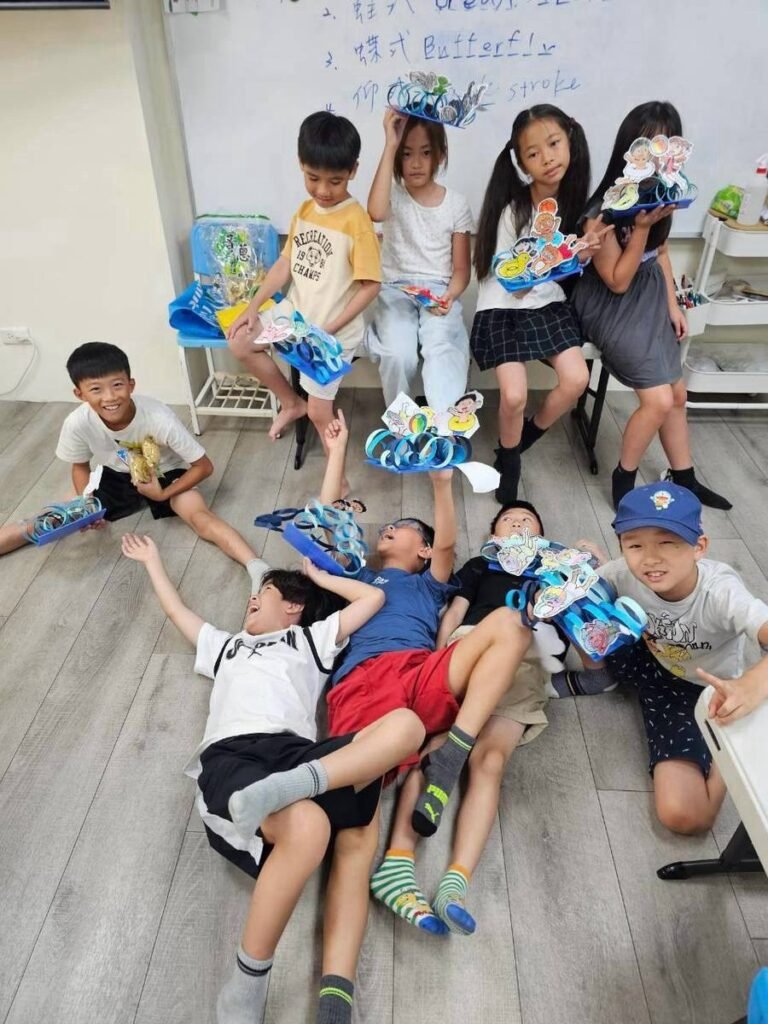 Good Good English camp children happily interacting Good Good English camp students enjoying a playful group moment