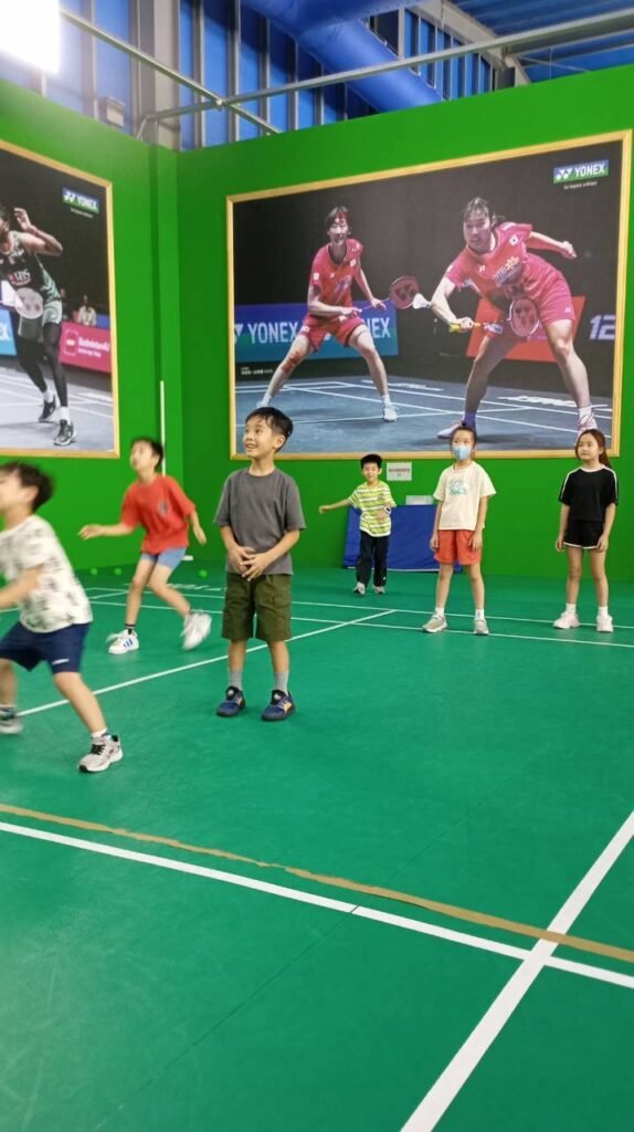 Good Good English students using English while playing sports